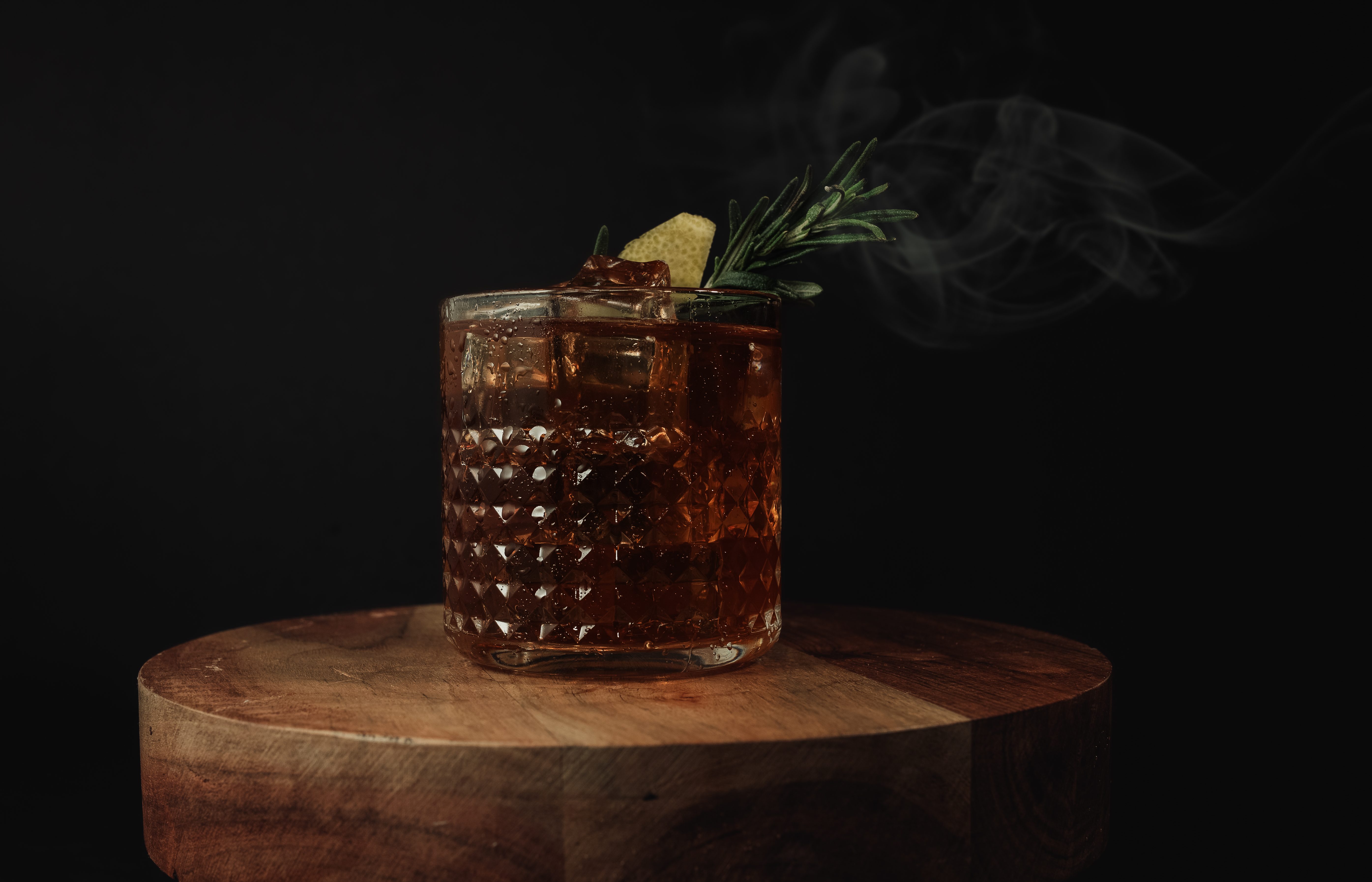 boulevardier by kitsap bartending services with smoked rosemary garnish