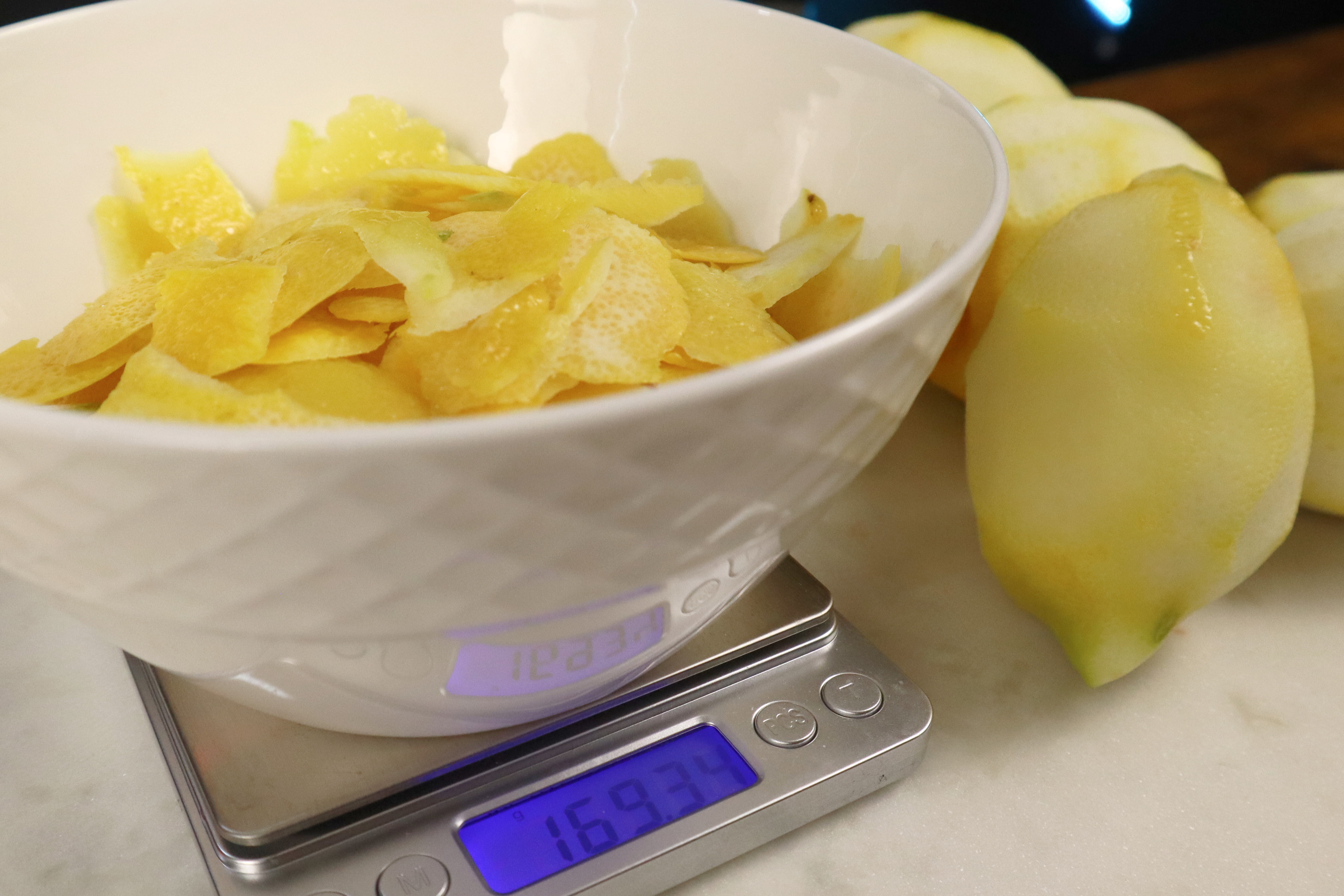 weighing citrus peels
